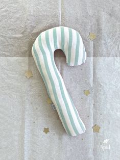 the number two is made out of white and blue stripped fabric with gold stars around it