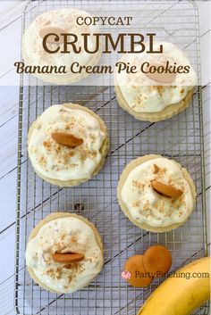 some cookies are on a cooling rack with icing and cinnamon sprinkles