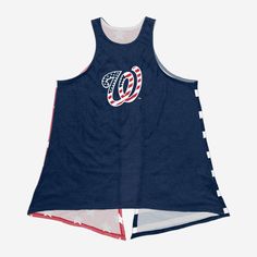 What this Washington Nationals Women's Americana Tie Back Sleeveless Top lacks in sleeves, it more than makes up for in patriotic team pride! Features All-over team-colored design on front so you can rep the team in style Team logo display and team-colored American flag-style wordmark team name display on front, in case there were any doubts where your allegiances lie Reverse side with two team-colored stars and stripes-designed tie-able ends that will look great at every Memorial Day and Fourth Sleeveless Basketball Top With Team Logo, Navy Tops With Team Name For Team Events, Navy Tops With Team Logo For Team Events, Team-colored Tops With Team Logo For Basketball, Throwback Team Tops For Sports Events, Collegiate Sleeveless Tops For Basketball, Throwback Sports Team Tops, Baseball Season Sports Top With Team Logo, Sports Tops With Team Logo For Baseball Season