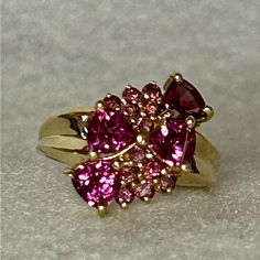 Multi Stones Of Pink Topaz In 10k Gold Ring. Size 7. Never Worn. Luxury Pink Topaz Round Ring, Luxury Pink Topaz Ring For Formal Occasions, Luxury Pink Multi-stone Sapphire Ring, Luxury Pink Oval Topaz Ring, Luxury Pink Topaz Ring With Center Stone, Pink Oval Multi-stone Ruby Ring, Fine Jewelry Pink Multi-stone Jewelry, Fine Jewelry Pink Cluster Ring With Accent Stones, Luxury Pink Multi-stone Ruby Ring