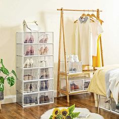 a bedroom with sunflowers on the floor and clothes in bins next to it