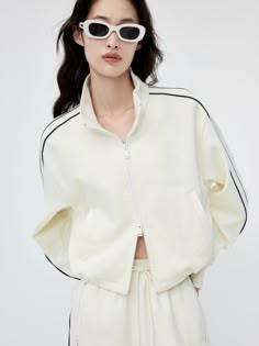 MO&Co. Women's Cotton Blend Contrast Track Suit Jacket Features : - Two‑way zipper closure- Adjustable elasticated hem- Contrast trim design- Athleisure silhouette Code: MBC1JKTT07The back length of size S is 45cmMATERIALS & CARE Material: 50.4% Cotton 49.6% PolyesterSeparate mild machine wash below 30°CDo not bleach, hang to dry in the shadeDo not tumble dry, low ironDo not dry clean, do not soakWash with neutral detergentReverse into mesh bag for washingNote: do not knead and iron special proc Track Suits Women, Athleisure Jacket, Sportswear Trends, Trim Design, Team Jackets, Sportswear Fashion, Sport Jacket, Woven Jacket, Activewear Fashion