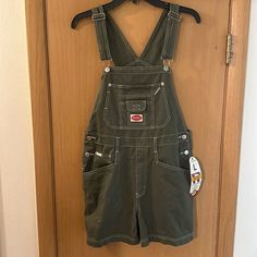 Revolt Clothing Co Women’s Shortalls Overalls In Army Green. Brand New With Tags. Y2k, 90s. Measures 32 Inches In Total Length And 4 Inch Inseam. Size Women’s Large. Casual Bib Front Overalls For Streetwear, Trendy Green Overalls With Pockets, Casual Green Shortalls With Pockets, Revolt Overalls, Character Chart, Green Overalls, Overalls Outfit, Gardening Outfit, Y2k 90s