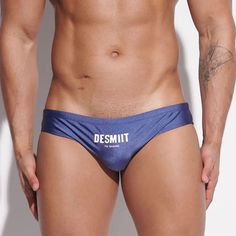 Everything a real jock would wear. Show your sexy side in the lockers with this pair of Swim Brief and get noticed. This Desmiit Second Skin Swim Brief will make an impression while you change in front of your muscle, sweaty and good-looking mates. Made with the finest cotton grade materials to make it smooth on your sensitive territories and long-lasting spandex to make them stretch to any athlete's needs. Beachwear Swim Trunks For Sports, Summer Water Sports Brief Swim Trunks, Summer Water Sports Swim Trunks Brief, Nylon Swim Trunks Briefs, Fitted Nylon Brief Swim Trunks, Stretch Swimwear Briefs For Pool, Beach Season Swim Trunks Brief, Stretch Swimwear For Pool, Stretch Brief Swimwear For Pool