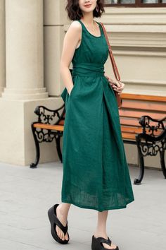 Stay effortlessly chic and keep your cool this summer with a stunning emerald linen dress. Embrace the breathable fabric that is perfect for those hot days.Ideal for ensuring comfort all through the day. Make your fashion statement this summer! DETAIL * 100% linen * Crew neckline * Two side pockets * Sleeveless linen dress * Plus size dress * Fabric Belt dress * Below knee length, midi dress * Suitable for summer and spring * Casual linen dresses, plus size linen dresses * Hand wash or machine w Casual Green Sleeveless Dress With Pockets, Green Sleeveless Maxi Dress With Pockets, Green Summer Midi Dress With Pockets, Green Midi Dress With Pockets For The Beach, Green Midi Dress With Pockets For Beach, Green Linen Sleeveless Summer Dress, Green Sleeveless Linen Dress, Green Beach Maxi Dress With Pockets, Green Linen Beach Dress Elegant