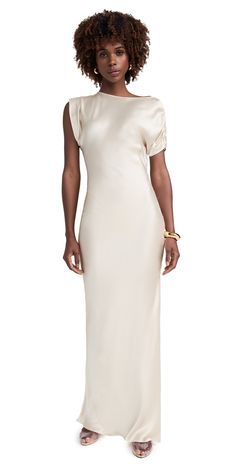 Find AMANDA UPRICHARD Elroy Silk Maxi Dress on Editorialist. Fabric: Lightweight, non-stretch silk charmeuse. Bias cut for slight stretch. Maxi length. Off-shoulder neckline. Short sleeve. Pullover design, no closure. Shell: 100% silk. Unlined. Dry clean. Imported, China. Measurements: Measurements from size XS Length: 62.25in / 158.0cm, from shoulder Bias Cut Dress With Sleeves, Chic Sheath Midi Dress With Bias Cut, Elegant Silk Crepe Dress For Spring, Formal Fitted Silk Crepe Midi Dress, Chic Satin Midi Dress With Draped Sleeves, Fitted Satin Midi Dress With Draped Sleeves, Chic Formal Silk Crepe Dress, Chic Formal Sheath Silk Dress, Elegant Silk Dress With Draped Sleeves For Spring