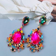 Rhinestone earrings-New Bohemia Colorful Crystal Drop Earrings High Quality Fine Geometric Rhinestones Dangle Earrings for Women Jewelry Party Gift Style: TRENDY Shape\pattern: Moon Metals Type: Zinc alloy Material: CRYSTAL Item Type: Earrings Gender: Women Fine or Fashion: Fashion Earring Type: Drop Earrings Model Number:3256803983352609 Condition: 100% Brand New And High Quality Color:As The Picture Material: Rhinestone Shopping Note :As different computers display colors differently, the color of the actual item may vary slightly from the above images, thanks for your understanding Eye-catching Dangle Earrings For Party, Multicolor Crystal Chandelier Drop Earrings, Multicolor Crystal Chandelier Earrings, Party Multicolor Crystal Earrings, Multicolor Crystal Earrings With Sparkling Stones, Multicolor Sparkling Stones Drop Earrings, Multicolor Rhinestone Earrings For Party, Multicolor Jeweled Crystal Earrings For Party, Multicolor Sparkling Drop Earrings