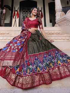 Aesthetically designed for your momentous day, here is a stunaning multi-colored dola silk lehenga beautified with foil-printed peacock and elephant motifs featured with lovely tassels. This stunning multi-colored dola silk lehenga arrives with maroon colored blouse festooned with foil print and comes with a beautiful kalamkari floral print dola silk maroon dupatta adorned with foil print and lovely tassels on the border. This Navratri wear multi-colored lehenga that is stitched up to 42 and com Navratri Multicolor Saree-style Lehenga, Bollywood Style Multicolor Lehenga For Navratri, Multicolor Anarkali Art Silk Choli, Navratri Multicolor Lehenga With Traditional Drape, Multicolor Art Silk Sets With Traditional Drape, Semi-stitched Multicolor Sets For Diwali, Multicolor Floor-length Sets For Navratri, Bohemian Art Silk Sets In Multicolor, Bohemian Sets In Multicolor Art Silk