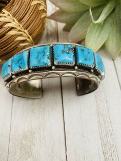 Pre-owned ETHNIC & REGIONAL STYLE : Native American COLOR : Blue MAIN STONE COLOR : Turquoise METAL : Sterling Silver MAIN STONE : Turquoise SETTING STYLE : Cluster BRAND : Nizhoni Traders LLC LOT : No JEWELRY TYPE : Bracelets TYPE : Bracelet STYLE : Cuff BASE METAL : Sterling Silver FEATURED REFINEMENTS : Navajo Sterling Silver Jewelry TRIBAL AFFILIATION : Navajo Awesome Vintage Old Pawn Navajo Kingman Turquoise and Sterling Silver Cuff Bracelet. Beautiful stones in this cuff! This cuff has an Southwestern Blue Cuff Jewelry, Blue Artisan Cuff Jewelry, Artisan Blue Cuff Jewelry, Artisan Blue Cuff Bangle Bracelet, Artisan Blue Cuff Bracelet, Artisan Blue Bangle Cuff Bracelet, Artisan Blue Bracelets Collectible, Silver Turquoise Jewelry, Beautiful Stones