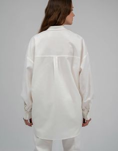 Oversize shirt made of summer natural fabric with hand embroidery. Shirt collar, button fastener. Long sleeve on the cuff.The length of the back is 76 cm / 29, 1 in. Sleeve length with cuff 63 cm / 24, 8 inCare: Machine wash 40°C. Spin: 600-800 rpm Do not tumble dry. Do not use chlorine bleaches or stain removers. Ironing: medium temperature, seamy side.Composition: 50% Tencel, 33% Cotton, 15% Linen, 2% ElastanAbout the brand:7/11 Seven Eleven has been working since July 2015. The brand creates Cotton Blouse With Embroidered Cuffs, Classic White Blouse With Roll-up Sleeves, Long Sleeve Cotton Blouse With Embroidered Cuffs, Casual Cotton Blouse With Embroidered Cuffs, Fall Cotton Blouse With Embroidered Cuffs, White Collared Blouse For Fall, Cotton Blouse With Embroidered Cuffs For Work, Cotton Tops With Embroidered Cuffs For Work, Cotton Top With Embroidered Cuffs For Work