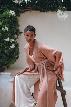 Our newest Dusty Pink Linen Kimono, has become already a bestseller in our show room and now available for you. This stunning outfit features a linen kimono and a belt that can be worn alone or as an extra layer with most of our dresses. With the help of the belt you can turn this kimono cardigan into a kimono dress. Crafted in Bali, this elegant kimono is completely made of organic linen that has anti-microbial and hypoallergenic properties, making it perfect for the body, adding grace and styl Cardigan With Belt, Boho Womens Clothing, Elegant Kimono, Kimono Boho, Bridesmaid Dresses Boho, Linen Kimono, Bohemian Kimono, Linen Cardigan, Organic Cotton Dress