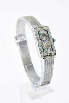 Art Deco Platinum Diamond Emerald Glycine Wristwatch | From a unique collection of vintage wrist watches at https://www.1stdibs.com/jewelry/watches/wrist-watches/ Diamond Shaped Face, Glycine Watch, Emerald Art Deco, Emerald Art, Art Deco Watch, Diamond Face Shape, Ring Watch, Channel Set, Art Deco Ring