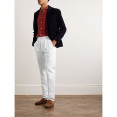 The 'Manny' trousers are one of Rubinacci's best-selling styles. This white pair has been made in Italy from cotton-twill and pleated through the front to emphasise the neat, tapered cut. Adjust the tabs on the cummerbund-style waistband for a comfortable, secure fit. White Semi-formal Bottoms With Welt Pockets, Classic Fitted White Chinos, Fitted Classic White Chinos, White Fitted Classic Chinos, Fitted White Chinos For Work, White Fitted Chinos For Work, Semi-formal White Bottoms With Welt Pockets, Elegant White Cotton Chinos, Semi-formal White Pants With Welt Pockets