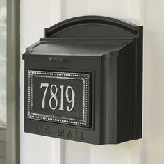 a black mailbox with the number 7819 on it