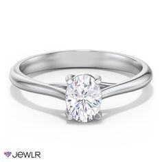 a white gold engagement ring with a round cut diamond