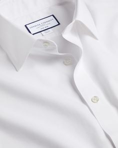 100% cotton, Available in classic, slim and extra slim fit, Classic collar, Split yoke for optimal fit and comfort, Classic and slim fit: back pleats for ease of movement, Extra slim fit: streamline back darts, Rounded two-button cuff or square French cuff, Complimentary brass collar stays, Machine washable - Non-Iron Poplin Shirt - White | Men's Charles Tyrwhitt Non-Iron Poplin Dress Shirt - White Single Cuff Size Medium Cotton Square French, Charles Tyrwhitt Shirt, White Dress Formal, White Dress Shirt, Charles Tyrwhitt, French Cuff, Collar Stays, Poplin Dress, Men's Wardrobe