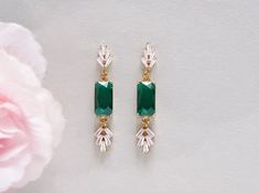 Emerald green bridal earrings, Art Deco earrings, Rectangle green Wedding Earrings, Statement Earring Baguette, Gold CZ Leaf Fan Earrings Made of: - gold plated over brass components with sparkling CZ and green crystals Total length: approx. 2 inches (50 mm) Come in a gift box at no extra cost, ready for gift giving. If you have any questions please send a message and I will be happy to answer you! Elegant Green Rectangular Earrings, Green Rectangular Jewelry For Party, Green Rectangular Earrings For Formal Occasions, Green Drop Earrings For Bridal Gift, Gold Emerald Rectangular Earrings, Gold Rectangular Emerald Earrings, Green Emerald Bridal Earrings As Gift, Green Dangle Bridal Earrings For Anniversary, Green Dangle Earrings For Anniversary