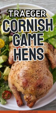 a close up of a plate of food with chicken and salad on the side text reads traeger's cornish game hens