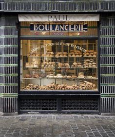 a bakery with lots of baked goods in the window