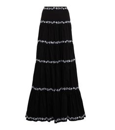 This tiered, ruffle skirt from Caroline Constas is cut in a maxi length, has a high waist and comes with white fleur-de-lis embroidery against a black backdrop. Black Tiered Maxi Skirt For Summer, Cotton Ruffled Maxi Skirt, Cotton Maxi Skirt With Ruffled Detail, Chic Cotton Maxi Skirt, Cotton Maxi Dress With Flowy Tiered Skirt, Long Cotton Dress With Ruffles, Cotton Long Skirt Dress With Ruffles, Cotton Maxi Length Ruffled Skirt, Chic Cotton Maxi Dress With Flowy Skirt