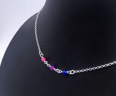 "Handmade sterling silver necklace. Different colored crystal beads making up the bisexual pride flag. Delicate silver chain. Order at least 2.5 cm (1\") longer than the intended wearers neck for a tight fit. Longer for a looser fit. Matching bracelet: https://www.etsy.com/listing/1024658633 Necklace and bracelet set (lower price): https://www.etsy.com/listing/1010685590 This is is a made to order listing and you'll get a necklace like the one in the pictures, not the exact copy in the pictures. Sterling Silver Crystal Necklace With Silver Beads For Gift, Gift Sterling Silver Crystal Necklace With Silver Beads, Gift Crystal Necklace With Beaded Chain In Sterling Silver, Sterling Silver Crystal Necklace With Beaded Chain For Gift, Gift Crystal Necklace With Beaded Sterling Silver Chain, Lesbian Beaded Necklace, Pride Beaded Necklace, Hidden Bisexual Jewelry, Bisexual Earrings