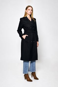 Step out in style with the Audrey Trench Coat by Lakeyo – the ultimate in sleek, sophisticated fashion.Crafted from a premium blend of 97% polyester and 3% spandex, this trench coat offers both style and comfort. The lightweight material makes it perfect for layering, while the tailored fit flatters your figure with a belted waist to accentuate your curves.Featuring a classic double-breasted front closure and a notched collar, the Audrey Trench Coat has a timeless, versatile look that never goes out of style. The premium material is both lightweight and durable, making it the perfect choice for any occasion.The Audrey Trench Coat by Lakeyo is available in a range of sizes, ensuring a perfect fit for any body type. Whether you're dressing up for a special event or simply running errands aro Fitted Double-breasted Wool Coat For Spring, Fitted Pea Coat With Belted Cuffs For Fall, Fitted Wool Coat With Belted Cuffs For Fall, Fitted Long Pea Coat For Spring, Solid Gabardine Pea Coat For Fall, Belted Solid Outerwear For Work, Winter Fitted Gabardine Pea Coat, Winter Belted Outerwear For Business Casual, Belted Solid Workwear Outerwear