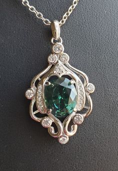 "Amazing Color-Change Synthetic Alexandrite, Green To Purple, See Video! 8x10mm Gem, 925 Sterling Silver Chandelier Design Pendant With 9 Cubic Zirconias, 18\" Sterling Chain. Chain Length Options Available By Messaging Seller At Time Of Purchase. Great Gift! *In Video, My Wife Walks From Kitchen Fluorescent/White Lighting To Natural Lighting From Window. Color Changing Effects Vary With Lighting." Chandelier Necklace, Alexandrite Jewelry, Blue Opal Ring, Silver Chandelier, Vintage Borders, Window Color, Diamond Rings Design, Gothic Accessories, Fun Jewelry