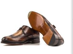 Experience the elegance of our Made in UK Monkstrap Shoes, a timeless blend of traditional English craftsmanship and modern style. Crafted with precision and care, these shoes are adorned with a stunning fire patina, making each pair a unique work of art. Key Features: Origin: Made in the UK, ensuring the highest standards of craftsmanship. Shipping: Your order will be meticulously crafted and shipped within 7-10 days after purchase. Materials: Fire patina leather, providing a distinctive and ca Timeless Slip-on Monk Strap Shoes For Galas, Timeless Monk Strap Slip-on Shoes For Galas, Timeless Monk Strap Shoes With Almond Toe For Galas, Timeless Almond Toe Monk Strap Shoes For Galas, Timeless Monk Strap Shoes For Galas With Round Toe, Classic Monk Strap Shoes With Removable Insole For Galas, Monk Strap Shoes For Galas, Timeless Monk Strap Shoes For Galas, Elegant Brown Goodyear Welted Monk Strap Shoes