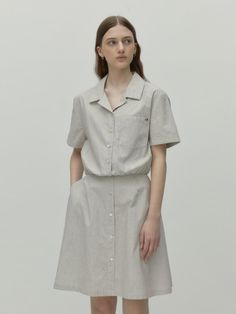 This is a modern and trendy shirt dress by DEPOUND that is made out of high quality cotton 100% fabric. With unique design detail and trendy mood, it will stand out from your casual daily outfit. - Classic mood eiwht open collar- High quality sea shell buttons- Lining in the skirt - Side pockets detail- Metal logo engraved charm Beige Button-up Cotton Dress, Cotton Relaxed Fit Shirt Dress For Work, Relaxed Fit Cotton Shirt Dress For Work, Beige Short Sleeve Shirt Dress With Pockets, Beige Cotton Shirt Dress For Daywear, Chic Neutral Shirt Dress For Work, Casual Neutral Shirt Dress For Day Out, Beige Cotton Dresses For Work, Collared Beige Cotton Shirt Dress