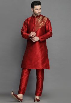 Art Silk Kurta in Maroon. This Readymade attire is Enhanced with Buttons. Crafted in Chinese Collar Neck and Full Sleeve. Available with an Art Silk Churidar in Maroon.Do note: Footwear shown in the image is for presentation purposes only. Half to one inch may vary in measurement. (Slight variation in actual color vs. image is possible). We sell all kinds of menswear. Mens Kurta | Mens Kurta Pajama | Mens Sherwani | Mens Sherwani Sets | Traditional Menswear | Partywear Menswear | Indian Mens Dre Red Art Silk Straight Kurta, Red Art Silk Kurta For Transitional Season, Red Art Silk Kurta For Navratri, Red Dabka Sherwani For Navratri, Red Sherwani With Self Design For Festive Occasions, Festive Red Sherwani With Self Design, Red Bandhgala For Navratri Festival, Red Art Silk Kurta For Diwali, Red Festive Sherwani For Puja