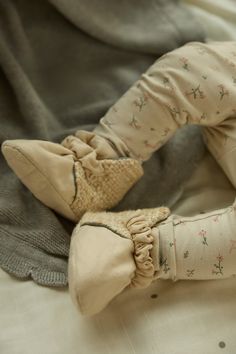 Introducing our Prim and Proper hand stitched booties with knit detail, crafted from luxurious organic cotton. These charming booties combine timeless elegance with superior comfort, making them a perfect addition to your little one's wardrobe. Organic Cotton Construction: Made from the finest organic cotton, our Prim and Proper booties offer exceptional softness and breathability, ensuring your baby's feet stay comfortable all day long. Hand Stitched Excellence: Each pair of booties is meticulo Knit Bonnet, Prim And Proper, Cozy Accessories, Charm Making, Baby Things, Baby Skin, Natural Dyes, Hand Stitched