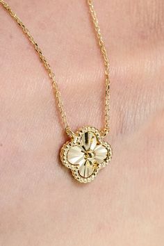 ITEM INFO Introducing our enchanting 14K Solid Gold Clover Diamond Cut Single Charm Necklace – a symbol of luck and luxury combined into a delicate 16" piece. This necklace is designed for those who seek a touch of elegance and a whisper of fortune in their daily wear. Here's why it's a treasure to behold: Symbol of Fortune: The clover charm, with its diamond-cut finish, sparkles with the promise of luck and prosperity. Luxurious Craftsmanship: Crafted from 14K solid gold, this necklace boasts a lasting shine and a premium feel. Elegant Simplicity: Its minimalist design makes it a versatile accessory, perfect for everyday elegance or as a subtle statement piece for special occasions. Comfortable Elegance: The 16" chain ensures a perfect fit, allowing the charm to rest beautifully at the co Elegant 14k Gold Necklaces For Good Luck, Elegant 14k Gold Necklace For Good Luck, Luxury Yellow Gold Necklace For Good Luck, Yellow Gold Flower Pendant Necklace With Diamond Cut, Yellow Gold Flower Pendant Necklace With Polished Finish, Yellow Gold Necklace With Flower Pendant And Polished Finish, Gold Flower Pendant Necklace For Good Luck, Elegant Good Luck Pendant Necklaces, Elegant Good Luck Pendant Jewelry