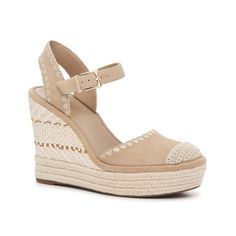 Vince Camuto-Artemea Wedge Sandal When the days get longer, you need a pair of shoes that can keep up. Our pick is the Artemea wedge sandals from Vince Camuto. This pair features must-have details including braided accents, a cap toe detail, and intricate stitching. Complete with an espadrille wedge heel and a lightly padded footbed to keep you comfortable until the sun sets. Beige Straw Wedge Sandals With Round Toe, Beige Straw Wedge Sandals, Beige Straw Wedge Heel Sandals, Beige Wedge Heels With Woven Sole, Beige Wedge Sandals With Woven Sole, Nice Sandals, Sun Sets, Espadrille Wedge, Natural Tan