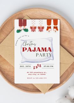 a christmas party flyer with stockings and stockings on the table next to a wooden platter