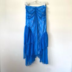 Urban Outfitters Uo Cj Lace Ruffle Midi Skirt In Blue. Body-Skimming Mid Rise Fit. Ruffle Detailing On The Sides. Ruching At The Waistband. Size Xs. New With Tags. Material: 84% Nylon 16% Spandex , Lining- 100% Polyester Waist: 24 Inches Approx Length: 30 Inches Approx Tags Ruched Skirt Asymmetrical Skirt Lace Midi Skirt Uneven 80s Look Colorful Boho Bohemian Elegant Blue Maxi Skirt With Ruffles, Elegant Blue Ruffled Maxi Skirt, Blue Asymmetrical Maxi Skirt For Party, Blue Flowy Maxi Skirt With Ruffles, Blue Ruffled Maxi Skirt For Party, Blue Asymmetrical Ruffled Skirt, Summer Tiered Skirt By Urban Outfitters, Blue Fitted Maxi Skirt With Ruffles, Summer Tiered Skirt From Urban Outfitters