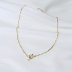 "14K Gold Toggle and Rolo chain necklace *The chain, toggle clasp and all components are 14K yellow gold (If you order a 16\" necklace, it will be a toggle clasp plus chain will be 16\".) The toggle clasp is about 12mm. 2.3mm Rolo chain Please read our policies before you place your order. https://www.etsy.com/shop/SashJewelry/policy?ref=shopinfo_policies_leftnav To see other Mother daughter necklace set click here: https://www.etsy.com/shop/SashJewelry?section_id=12441134&ref=shopsection_le Yellow Gold Toggle Necklace With Oval Link Cable Chain, Gold Toggle Necklace With Oval Link Cable Chain, Everyday Gold Lariat Necklace With Lobster Clasp, Gold Toggle Necklace With Cable Chain, Gift Toggle Necklace With Delicate Chain, Classic Gold Toggle Necklace With Adjustable Chain, Delicate Chain Link Toggle Necklace For Gift, Minimalist Toggle Clasp Link Necklace, Minimalist Link Toggle Necklace