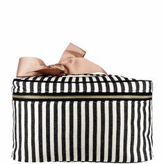 Get ready for effortless travel or home organization without any mess. Introducing; Bag-all's Medium Box Makeup & Toiletry in Striped! The high-quality cotton material makes the solution long-lasting. The laminated inner lining in our signature black and white stripes, makes for easy and quick clean/ups. This best-seller comes in the perfect medium size, fitting all your beauty essentials while on the go or organizing at home. With its durable gold metal zipper and recycled grosgrain ribbon, you Airport Travel Style, Packing Bags Travel, Media Makeup, Time To Travel, Travel Bag Organization, Airport Travel, Packing Jewelry, Striped Bags, How To Make Ribbon