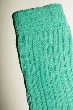 Slouchy knee high socks in a cotton/nylon blend. Thick ribbed cuff and a slim, fitted foot. Made in the USA. Available in multiple colors. Casual Green Knee-high Socks, Trendy Fitted Green Socks, Green Stretch Socks For Fall, Stretch Green Socks For Fall, Trendy Knitted Socks For Spring, Casual Cotton Knee-high Socks One Size, Spring Knitted One-size Socks, Trendy Green Fall Socks, Green Stretch Cotton Socks