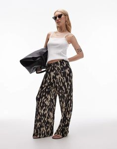 Topshop Petite abstract leopard print plisse pants in mono | ASOS Trendy Leopard Print Summer Pants, Elegant Leopard Print Summer Bottoms, Summer Black Viscose Pants, Black Viscose Summer Pants, Black Viscose Pants For Summer, Chic Leopard Print Summer Pants, Casual Leopard Print Bottoms For Night Out, Chic Leopard Print Bottoms For Spring, Chic Leopard Print Trousers