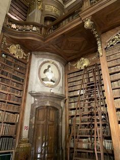 an old library with many wooden bookshelves