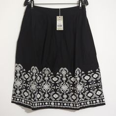 Boden Embroidered Skirt Size 8 Black And White In Color Embroidered Black Skirt For Summer, Black Cotton Skirt With Floral Embroidery, Black Floral Embroidered Skirt, Black Skirt With Floral Embroidery, Traditional Black Bottoms For Spring, Traditional Black Skirt For Summer, Blue Polka Dot Skirt, White Polka Dot Skirt, Applique Skirt