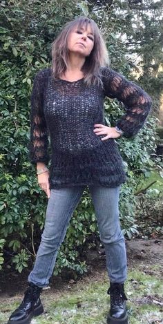 Unleash your inner Wednesday Addams with a gorgeous flattering jumper, knitted with a luxurious mix of alpaca and merino wool to create a knit which is light and airy with yarn over stitches to create holes for a punky goth grunge vibe. Hand knitted to order with love and care in the U.K., available in different sizes and a variety of colours.  XS Width 36cm  Length 78cm S    Width 40cm Length 80cm M   Width 44cm Length 82cm L    Width 50cm Length 84cm XL Width 54cm  Length 86cm The sizes might Black Bohemian Sweater For Layering, Hand Knitted Black Sweater For Winter, Knitted Mohair Sweater For Fall, Mohair Long Sleeve Sweater For Fall, Casual Mohair Sweater For Winter, Black Bohemian Sweater For Fall, Bohemian Black Sweater For Fall, Fall Bohemian Black Sweater, Fitted Alpaca Sweater For Winter