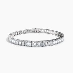 The most timeless four-prong diamond tennis bracelet is simply stunning featuring 11.00CTW Lab Grown Emerald cut diamonds. This elegant emerald shaped diamond bracelet is embellished by the clean lines and stunning details. Black Diamond Pendant, Black Diamond Studs, Halo Diamond Earrings, Solitaire Diamond Pendant, Colored Diamond Rings, Diamond Tennis Bracelet, Halo Earrings, Black Diamond Ring, Brown Diamond