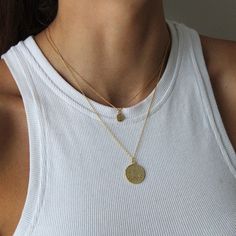 A unique silver or gold coin necklace is a must have, timeless addition to your jewellery collection. The mini Queen Elizabeth coin necklace looks adorable on layered or worn solo!   Historically, coin necklaces were given as a token of love, a sentimental reminder to keep the giver's memory close at heart. They were worn to bring luck and good fortune to the wearer.    💖 Details 925 Sterling Silver & 18k gold plated 41 cm - 46 cm including 5 cm extension chain Pendant: 10 mm 💕 Stay up-to-date with new designs & special offers - FOLLOW ME - website: thejewellerytree.net   Socials: @myjewellerytree OR https://www.facebook.com/thejewellerytree1/   💕 Need more info, feel free to email - I'd love to help 💕And please visit my NEW store https://www.etsy.com/au/shop/TheJewelleryTreeCo  I care Dainty Coin Pendant Necklaces For Layering, Dainty Coin Pendant Necklace For Everyday, Dainty Coin Pendant Necklace For Layering, Dainty Everyday Necklace With Coin Pendant, Everyday Minimalist Coin Necklace, Minimalist Everyday Coin Necklaces, Minimalist Everyday Coin Necklace, Silver Charm Necklaces With Coin Pendant, Silver Charm Necklace With Coin Pendant For Layering