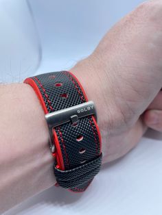 Golby Watch Straps Ltd Presents: 22mm, black and red hybrid rubber strap with red stitching and steel buckle Fitting Width - 22mm Strap Colour -black with red edging and red stitching. Strap - This is a rubber based hybrid strap. The underside that touches the skin is FKM rubber (Fluoroelastomers) and the top part TPU (Thermoplastic polyurethane). This combination of materials makes the strap very strong, flexible and durable. Clasp / Buckle Colour - Steel Clasp / Buckle - Made from 304 stainles Modern Red Watch With Leather Strap, Black Leather Watch Band For Outdoor Use, Black Leather Watch Bands For Outdoor, Black Watch Accessories With Leather Strap For Outdoor, Black Leather Watch Bands, Black Leather Strap Watch Bands For Outdoor, Brown Tweed, Watch Straps, Red Fabric