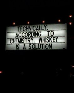 a sign that says, technically according to chemistry whiskey is a solution