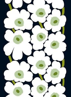 white flowers with green centers on a black background