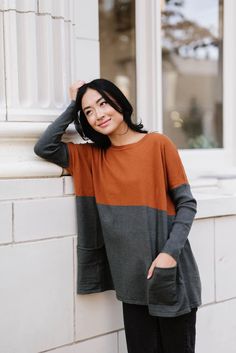 This color block sweater is the perfect blend of cozy and cute thanks to its soft knit material and autumn-inspired colorway. Double pockets are perfect for keeping your hands toasty warm all season long.  Details: Small/Medium: 55” bust, 55” waist, 2.7” long, 14” sleeve Medium/Large: 57” bust, 57” waist, 28.5” long, 1 Color Block Sweater, Autumn Inspiration, Knitting Materials, Soft Knits, Color Block, Winter Outfits