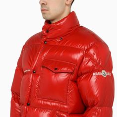 Red quilted nylon down jacket from 7 Moncler Frgmt Hiroshi Fujiwara featuring an asymmetrical front fastening, three front pockets, a logo patch on the sleeve and a removable hood. Composition: Fabric I: 100% Polyamide / Padding: 90% Down - 10% Feather | Moncler Genius Men's Anthemium Red Nylon Down Jacket | FW22/23 Hiroshi Fujiwara, Moncler Genius, Red Quilts, Down Jacket, Patch Logo, Coats Jackets, Composition, Red, Fabric