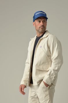 The Drill Chore Jacket has double patch pockets with a hand warmer on the top and flat pocket on the bottom. The inside of this jacket is finished with a yoke lining and self-fabric facing. All SKU styles undergo prewashing or garment-dyeing processes to eliminate shrinkage and achieve a worn-in look, as if you've owned the garments for years. 100% cotton drill 9 oz from Mount Vernon. Two-hole fisheye buttons. Raglan Sleeves. Wash in cold water with like color garments. Model is 6' wearing size Unstructured Button-up Sport Coat With Pockets, Unstructured Long Sleeve Shacket With Patch Pockets, Unstructured Winter Shacket With Patch Pockets, Unstructured Winter Shacket With Pockets, Utility Sport Coat With Lapel Collar And Pockets, Utility Sport Coat With Lapel Collar, Unstructured Utility Sport Coat With Pockets, Casual Unstructured Sport Coat With Flap Pockets, Spring Unstructured Sport Coat With Patch Pockets